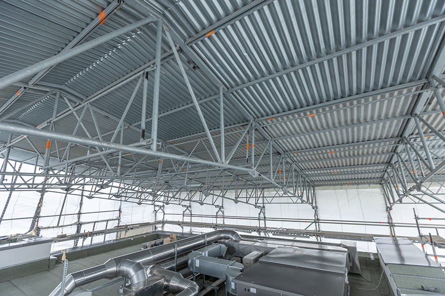  Gerüstbau Mank - Rostock - Gerüst mit Wetterschutzdach für Umbau EFH 