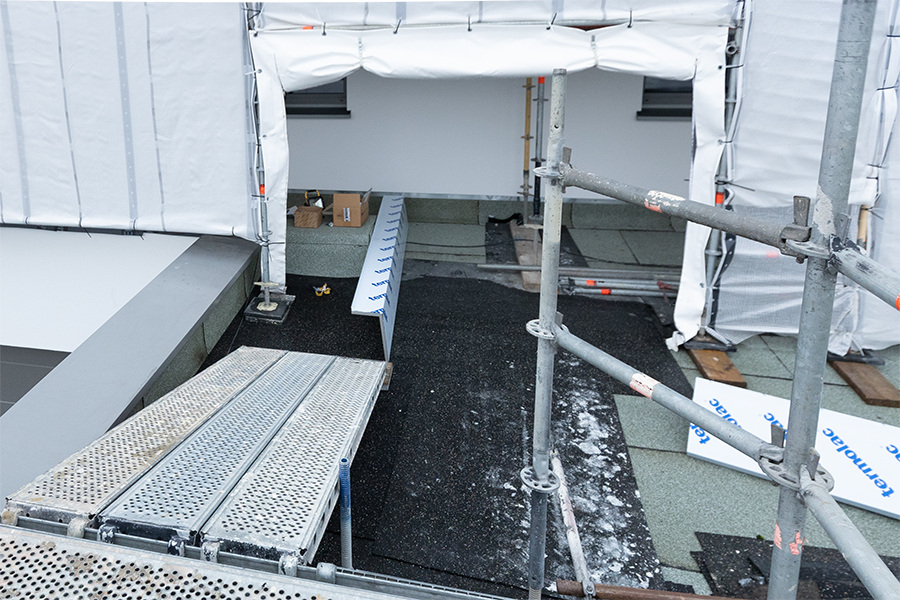  Gerüstbau Mank - Rostock - Gerüst mit Wetterschutzdach für Umbau EFH 