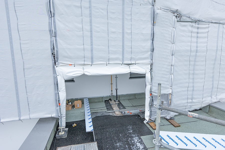 Gerüstbau Mank - Rostock - Gerüst mit Wetterschutzdach für Umbau EFH 