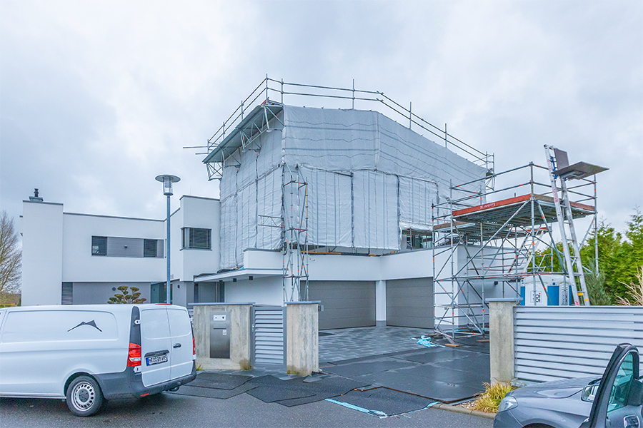  Gerüstbau Mank - Rostock - Gerüst mit Wetterschutzdach für Umbau EFH 